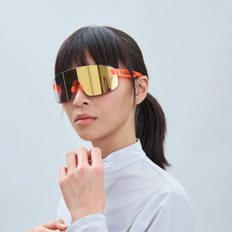 POC Elicit + Fluorescent Orange Translucent / Clarity Road Partly Sunny Gold Mirror & transparente Wechselscheibe
